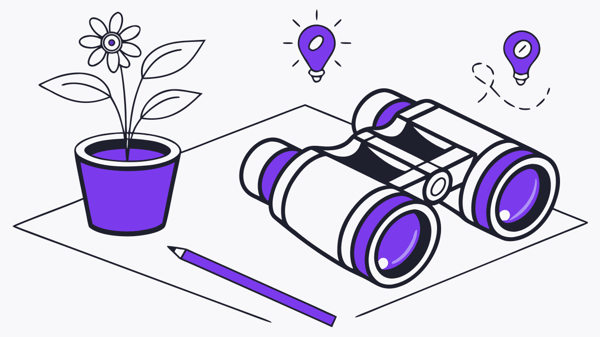 Binoculars on a table next to a plant whose flowers are light bulbs